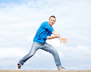 Image showing handsome boy making dance move