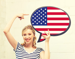 Image showing smiling woman with text bubble of american flag