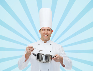 Image showing happy male chef cook with pot and spoon