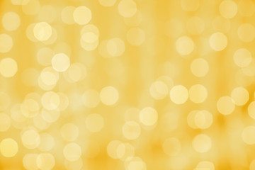 Image showing blurred golden background with bokeh lights