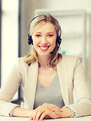 Image showing friendly female helpline operator