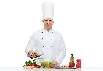 Image showing happy male chef cook cooking food