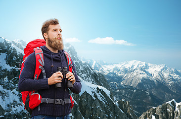 Image showing man with backpack and binocular outdoors