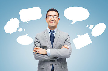 Image showing happy smiling businessman in eyeglasses and suit