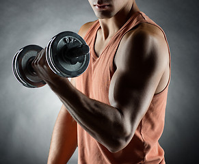 Image showing young man with dumbbell