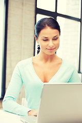 Image showing happy woman with laptop computer