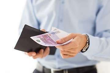 Image showing close up of businessman hands holding money