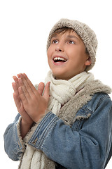 Image showing Boy hands together looking up