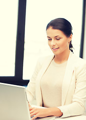 Image showing happy woman with laptop computer