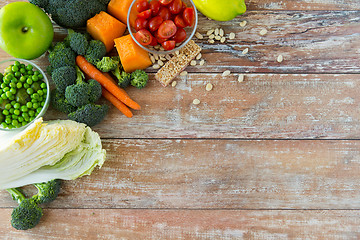 Image showing close up of ripe vegetables on wooden table