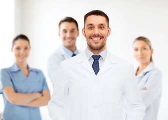 Image showing smiling male doctor in white coat