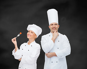 Image showing happy male chef cook thinking