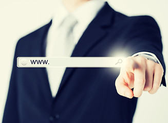 Image showing businessman pressing Search button