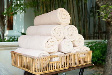 Image showing rolled bath towels at hotel spa