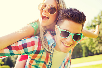 Image showing smiling couple having fun in park