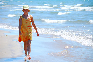 Image showing Girl walk beach