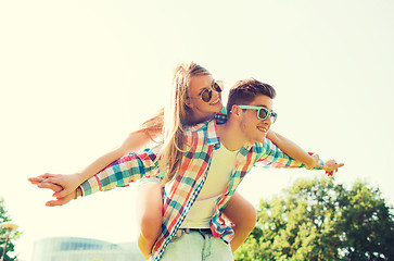 Image showing smiling couple having fun in park