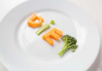 Image showing close up of plate with vegetable diet letters