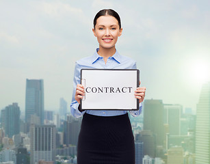 Image showing smiling businesswoman with contract