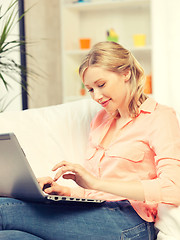 Image showing happy woman with laptop computer