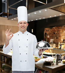 Image showing happy male chef cook with cloche showing ok sign