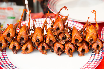 Image showing grilled or fried quail on plate at street market