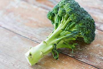 Image showing close up of broccoli on wooden table