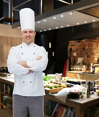 Image showing happy male chef cook with crossed hands