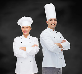 Image showing happy male chef cook with crossed hands