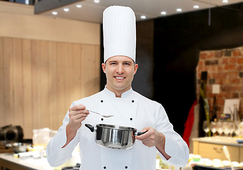 Image showing happy male chef cook with pot and spoon