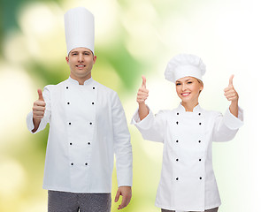 Image showing happy male chef cook showing thumbs up