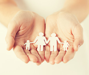 Image showing womans hands with paper man family