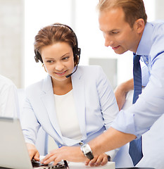 Image showing group of people working in call center