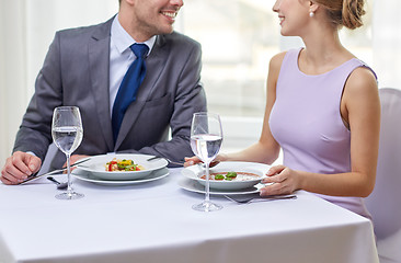 Image showing close up of couple talking at restaurant