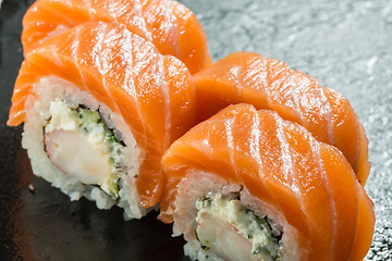 Image showing Salmon and caviar rolls served on a plate