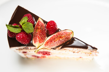 Image showing cake with chocolate, fig and raspberry