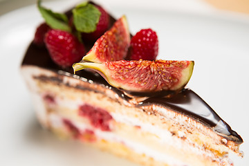 Image showing cake with chocolate, fig and raspberry