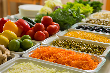 Image showing salad bar with vegetables in the restaurant