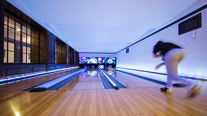 Image showing Young man playing bowling