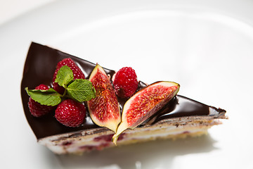 Image showing cake with chocolate, fig and raspberry