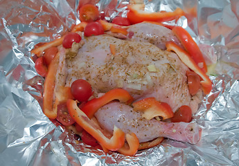 Image showing Chicken baked in foil with vegetables