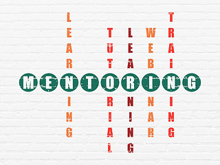 Image showing Education concept: word Mentoring in solving Crossword Puzzle