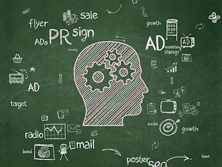 Image showing Marketing concept: Head With Gears on School Board background