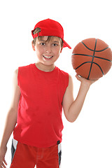 Image showing Happy child holding basketball