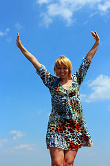 Image showing blue-eyed sympathetic girl and blue sky