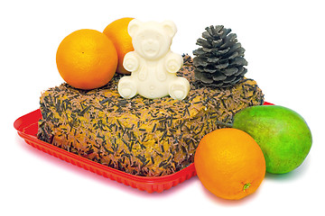 Image showing Delicious cake on and fruit on a white background.