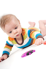 Image showing Portrait of cute baby boy with toy