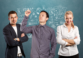 Image showing Teamwork and Asian Man Writing Something