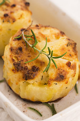 Image showing potato gratin with fresh rosemary