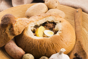 Image showing traditional white borscht (zurek) with sausage,egg and mushrooms